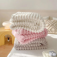 Couverture Cosy à Pompons